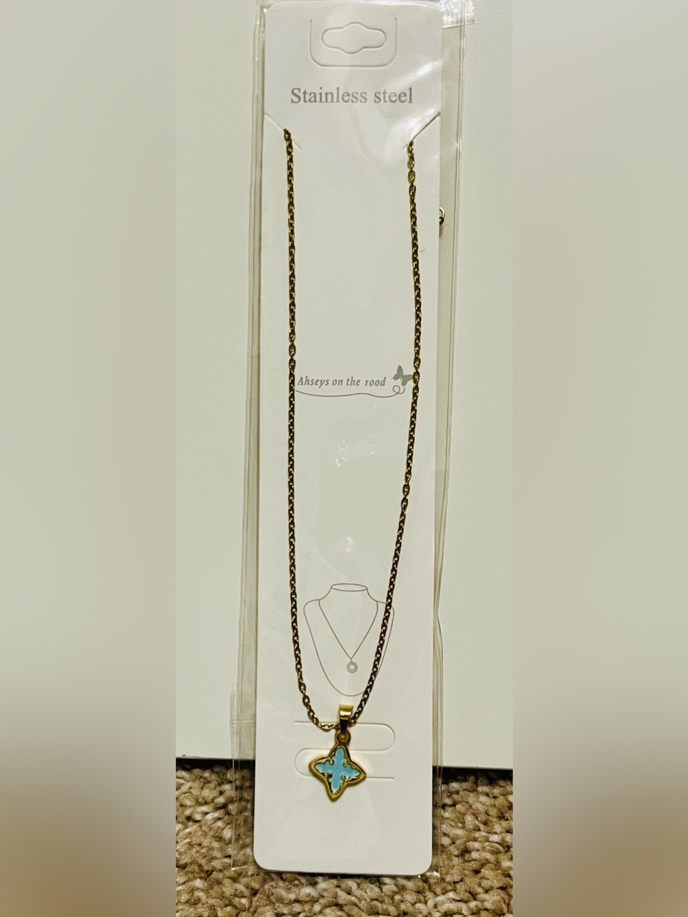 Stainless Steel Gold Tone Necklace with Blue Clover Pendant